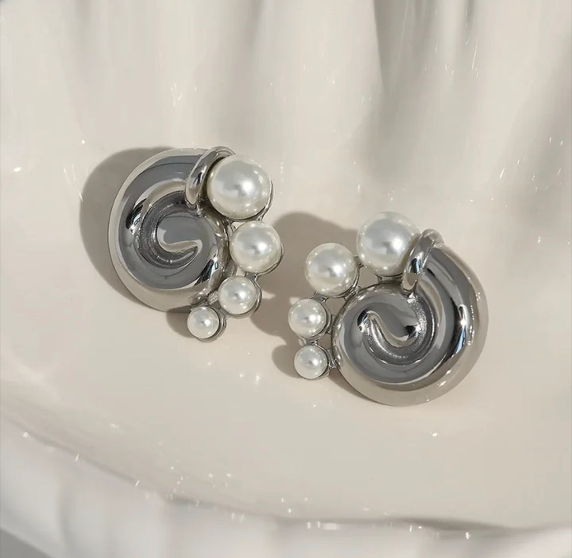 Pearl snail statement stud earrings