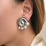 Pearl snail statement stud earrings