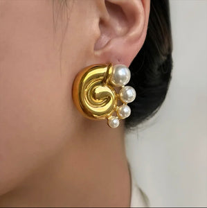 Pearl snail statement stud earrings